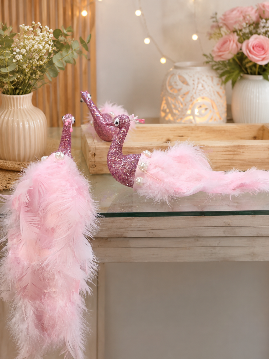 pink artificial peacocks with feathers