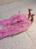 pink artificial peacocks with feathers