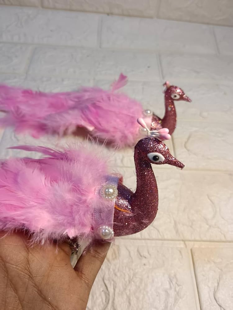 pink artificial peacocks with feathers