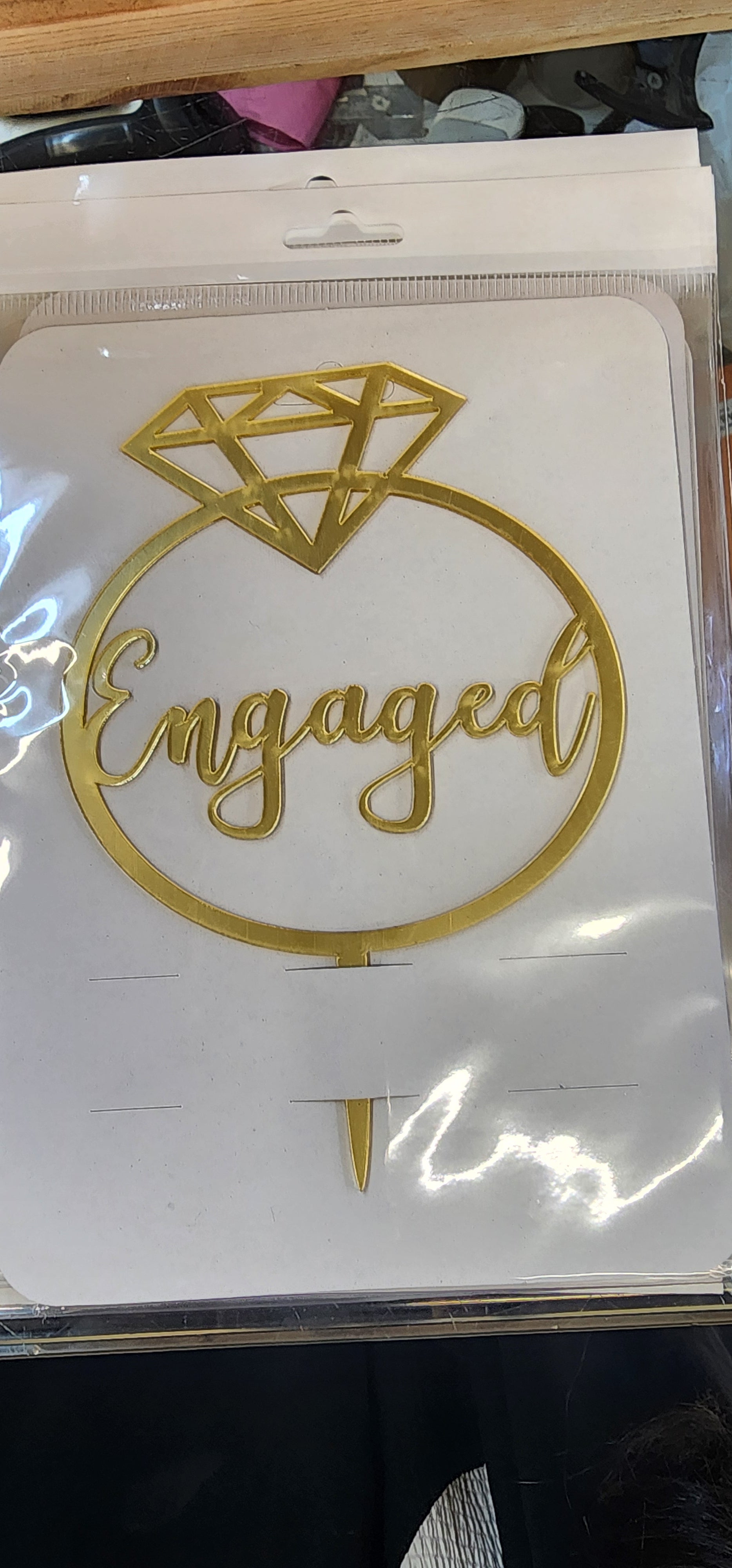 Engaged topper