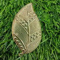 Branch metal leaves with dots