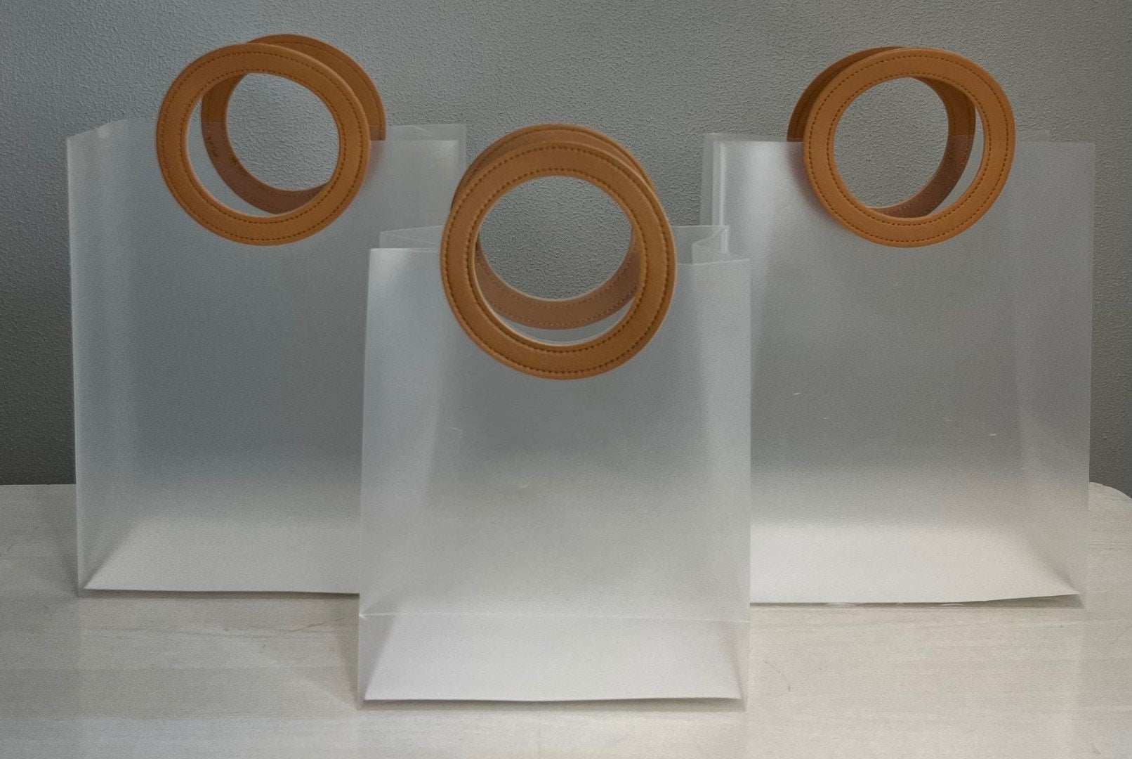 Round brown leather handle translucent Bag