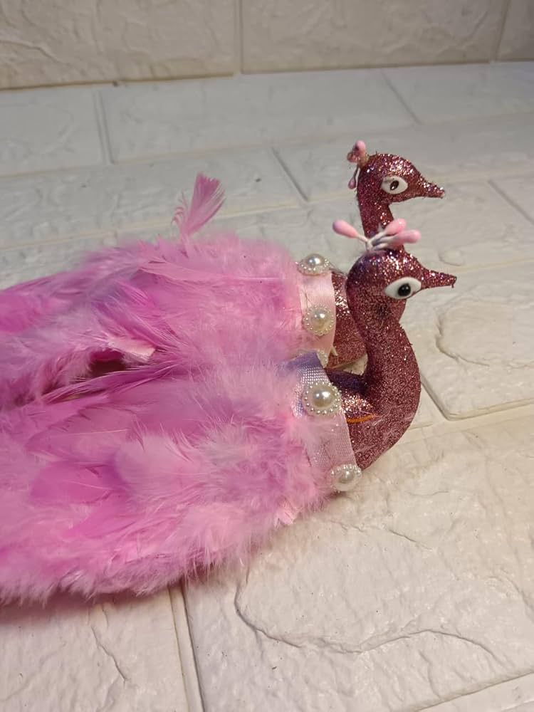 pink artificial peacocks with feathers